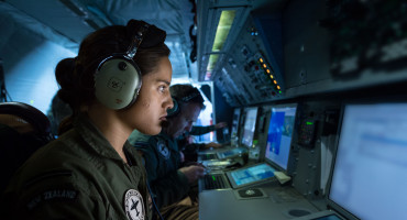 Royal New Zealand Air Force service-member on a computer