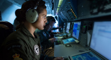 Royal New Zealand Air Force service-member on a computer