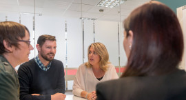 Veterans' Affairs staff discussing a topic