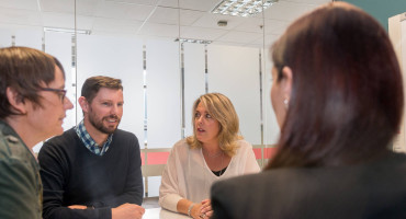 Veterans' Affairs staff discussing a topic