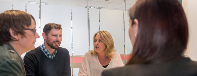 Veterans' Affairs staff discussing a topic