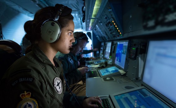 Royal New Zealand Air Force service-member on a computer