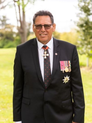 Portrait of Sir Wayne Shelford wearing medals