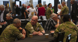 Uniformed men sitting at Christchurch event