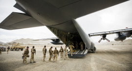 Soldiers entering a plane in Afghanistan
