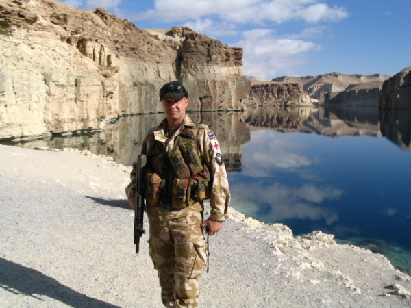 Tony Spice by a lake in Afghanistan